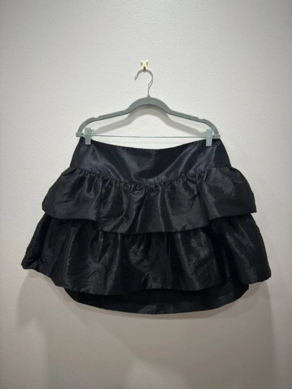 Black ruffle mini skirt
